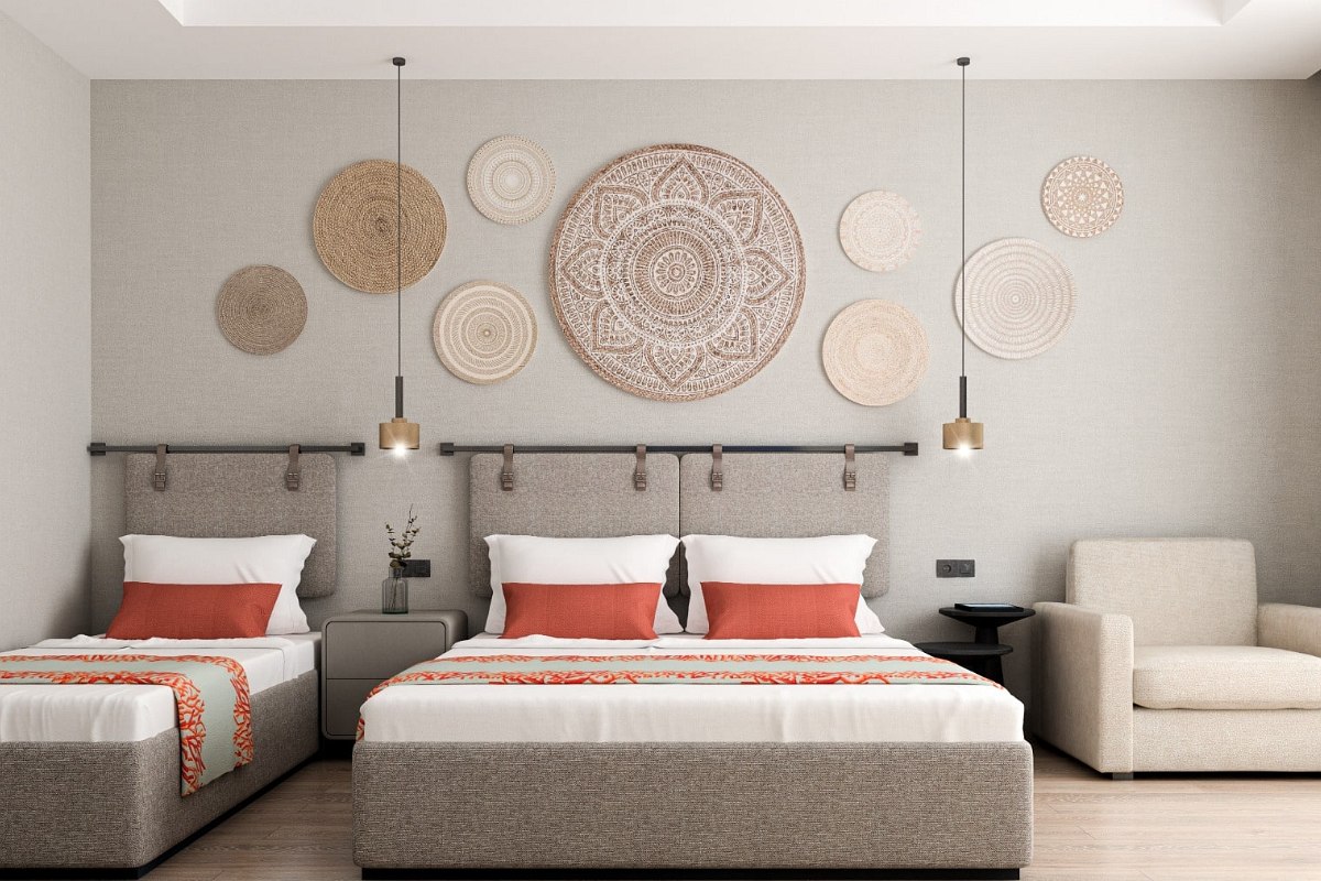 Modern eingerichtetes Doppelzimmer mit elegantem Design, komfortablen Betten und stilvollen Dekoelementen.