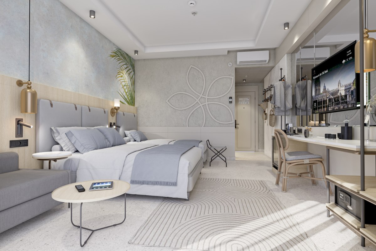 Elegantes Hotelzimmer mit zwei Betten, stilvollem Interieur und Balkon mit traumhaftem Meerblick bei Abenddämmerung.
