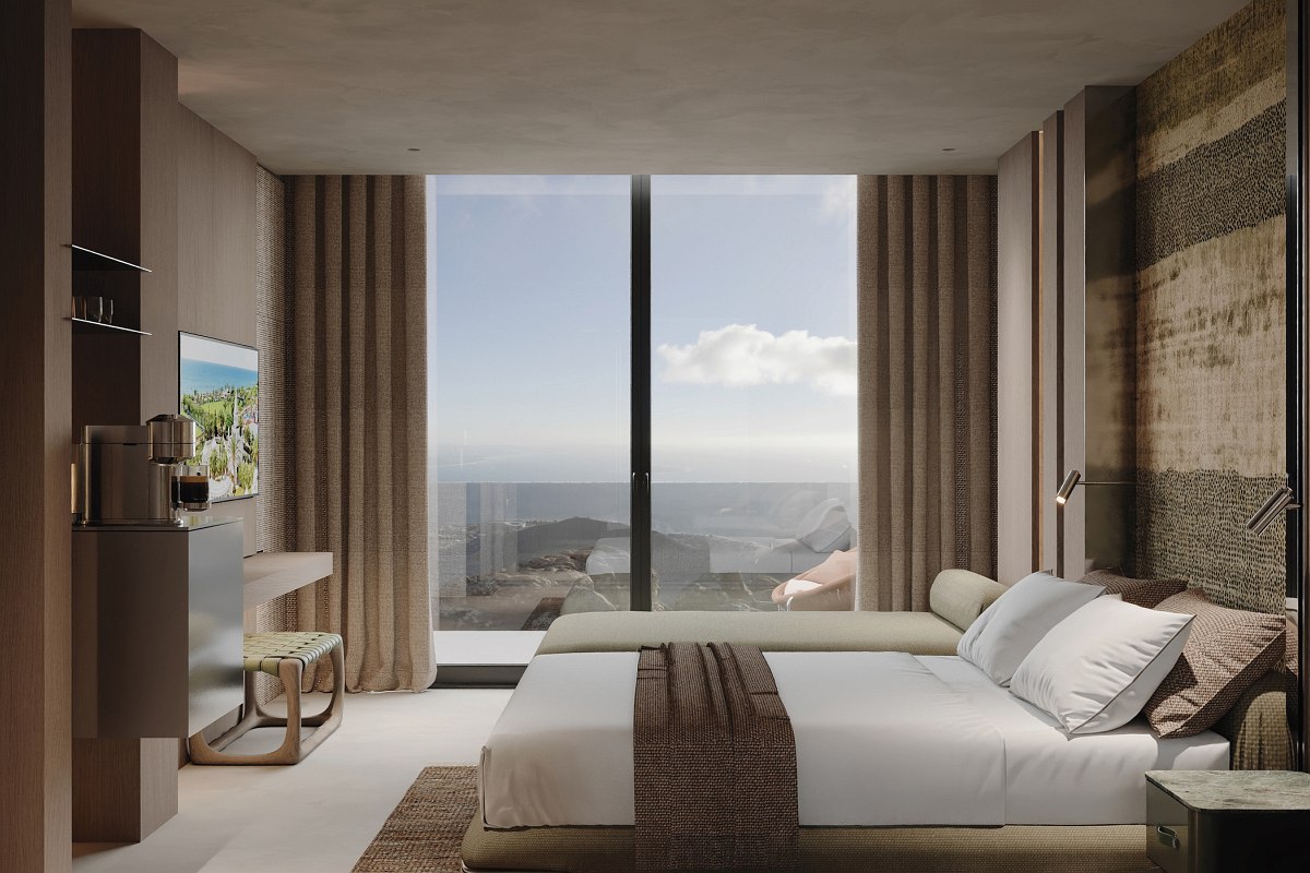 Modernes Hotelzimmer mit Doppelbett, Sitzbereich, Flachbild-TV, Schreibtisch, Blumen und Obstschale auf dem Tisch.
