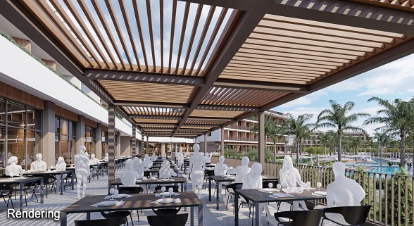 Elegantes Restaurant mit klassischem Interieur, stilvollen Polsterstühlen, roten Tischläufern und opulentem Kronleuchter unter einer kunstvoll gestalteten Decke.