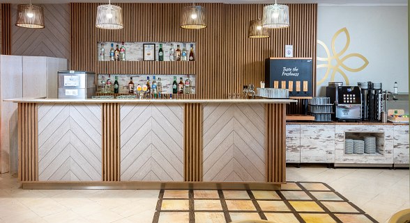 Buffet with cheese, vine leaves, fresh vegetables and fruit, decoratively arranged at Sentido Bellevue Beach