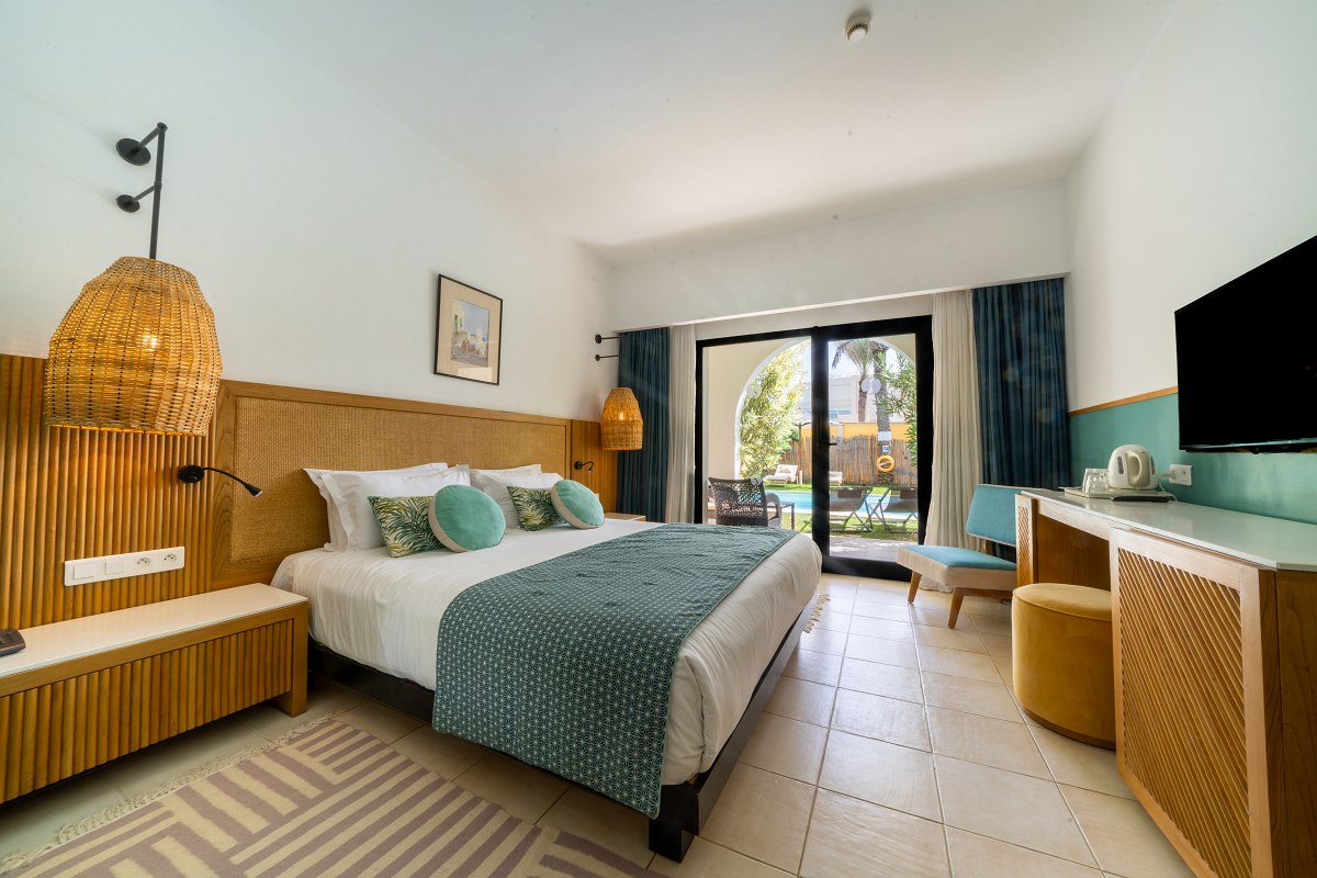 Comfortable room with garden view and modern furnishings.