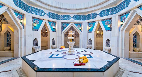 Magnificently designed hammam with marble, oriental tiles and atmospheric lighting.