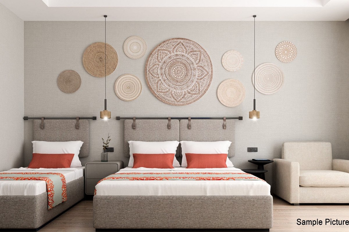 Modern double room with elegant design, comfortable beds and stylish decorative elements.