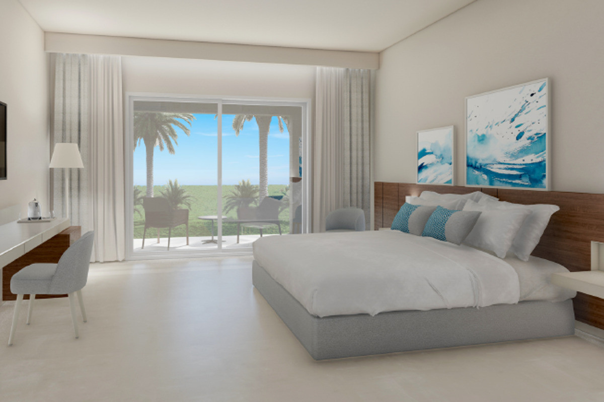 Modern, bright room with elegant decor, spacious layout, large mirror, and natural light from a window. Comfortable and stylish.